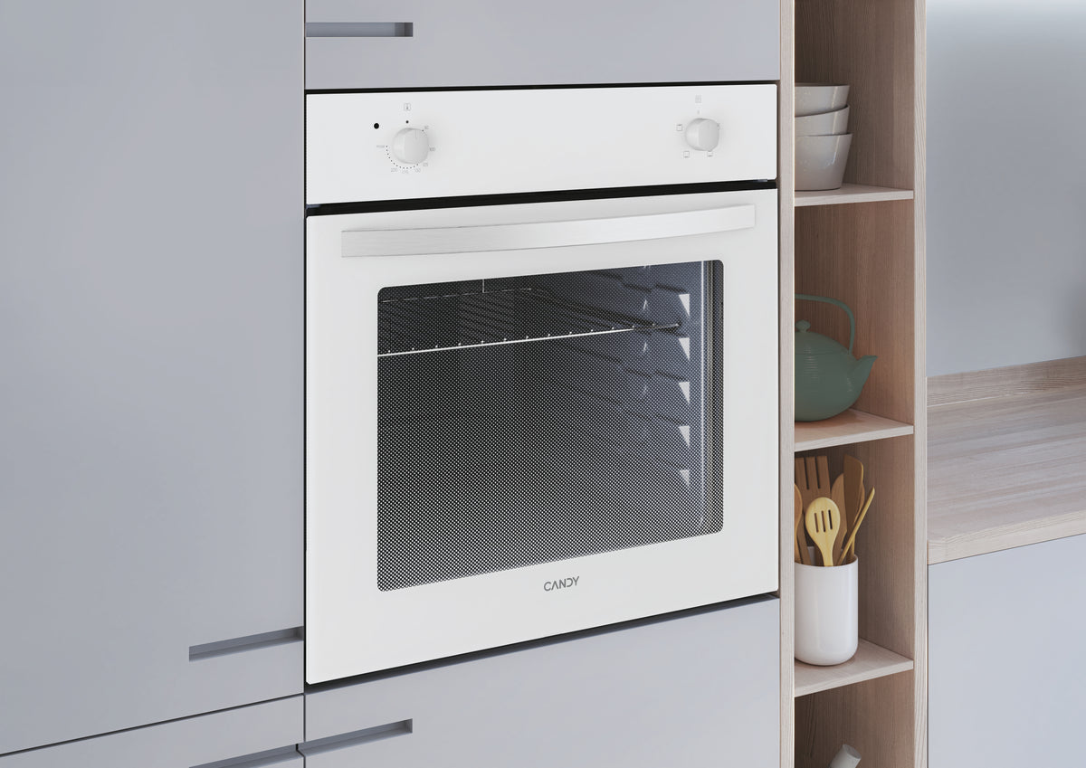 Four encastrable CANDY FIDC B100 - Nettoyage manuel - Convection naturelle - 70L - Blanc - Classe A