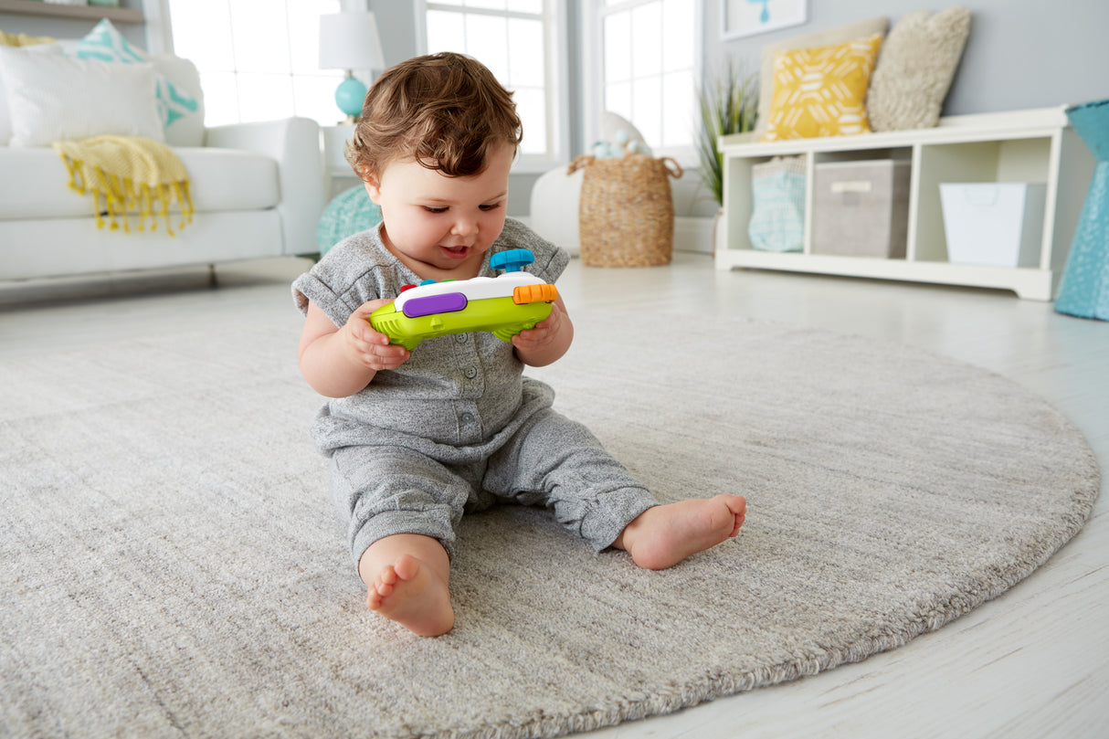 Fisher-Price-Manette de jeu et d'apprentissage Rires et Éveil HXB63