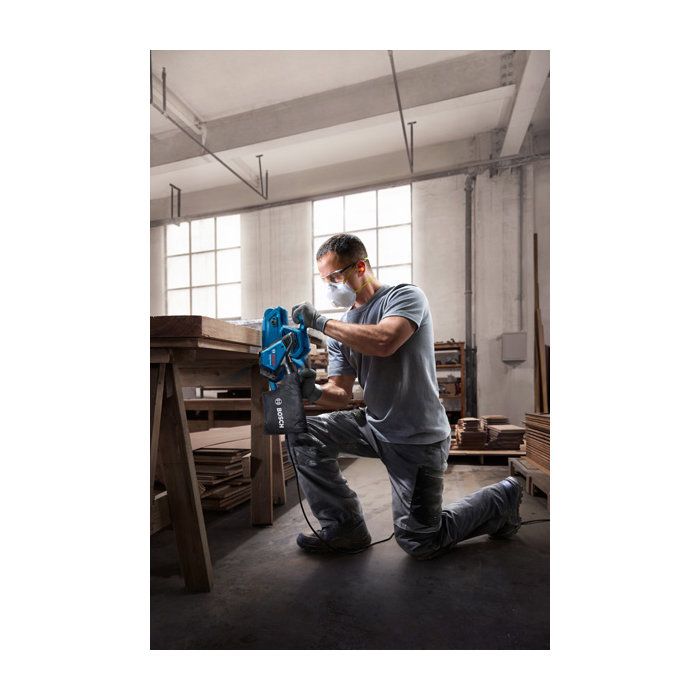 Ponceuse ŕ bande filaire BOSCH PROFESSIONAL - GBS 750 - 230V - 850W - 200 – 420 m/min - Bande abrasive + sac poussičres