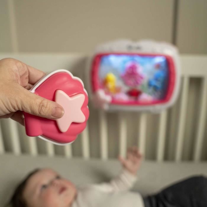 BABY EINSTEIN Veilleuse bébé -Reves marins rose- Réglage 25 min lumiere, son, musique ou bruit de l'océan apaisantes, télécommande