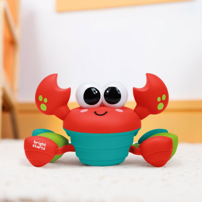 BRIGHT STARTS Crabe qui marche, Jouet bébé 6M+, jouet musical, jouet de motricité globale et fine, capteurs a obstacle, rouge