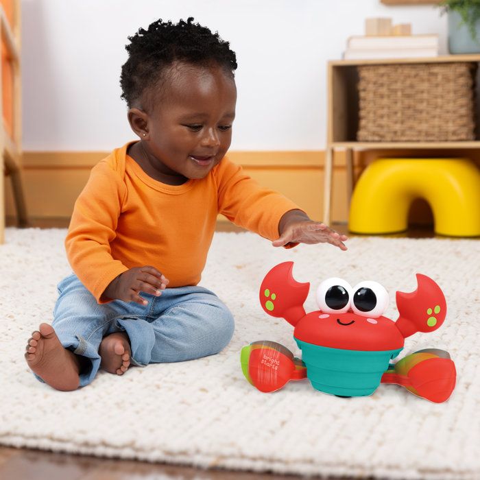 BRIGHT STARTS Crabe qui marche, Jouet bébé 6M+, jouet musical, jouet de motricité globale et fine, capteurs a obstacle, rouge