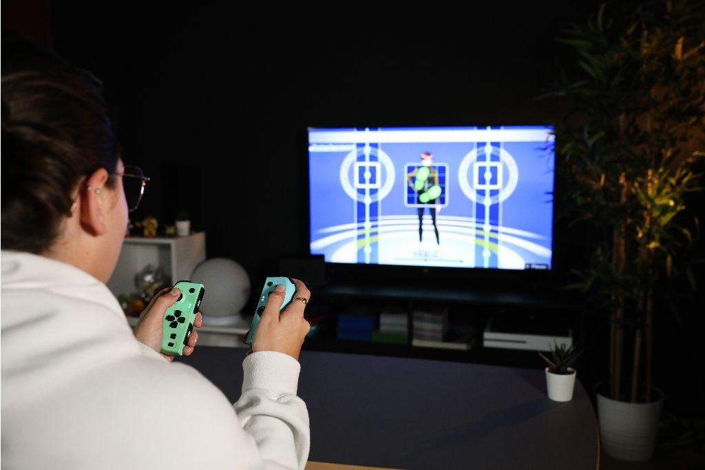 Manettes Joypads - Nintendo Switch et Switch OLED - KONIX - Autonomie 8 h - Fonction vibration - Vert et bleu