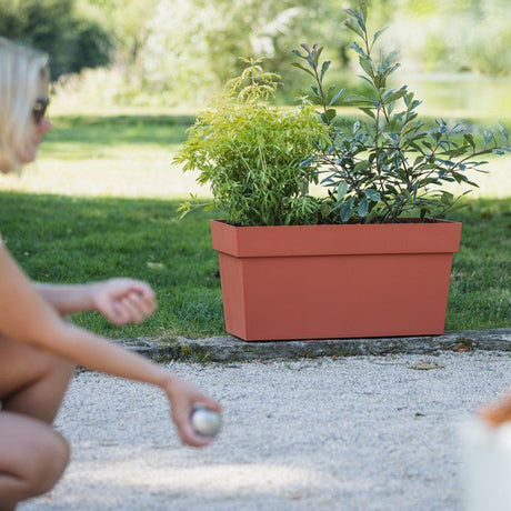 Jardiniere Muret a réserve d'eau avec roulettes - EDA - Toscane - 74 L - 79 x 35 x H.39 cm - Orange Terre Battue