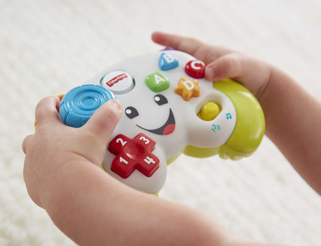 Fisher-Price-Manette de jeu et d'apprentissage Rires et Éveil HXB63