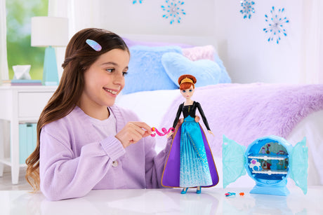 Poupée Jewel Reveal Anna, La Reine des Neiges, accessoires avec 8 surprises, 1 boîte a bijoux en forme de flocon de neige, 1 bague p