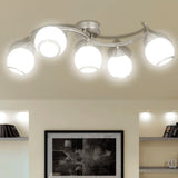 Ceiling light with glass shade on wavy track