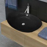 Lavabo ovale en céramique noir avec trop plein 59 x 38,5 cm