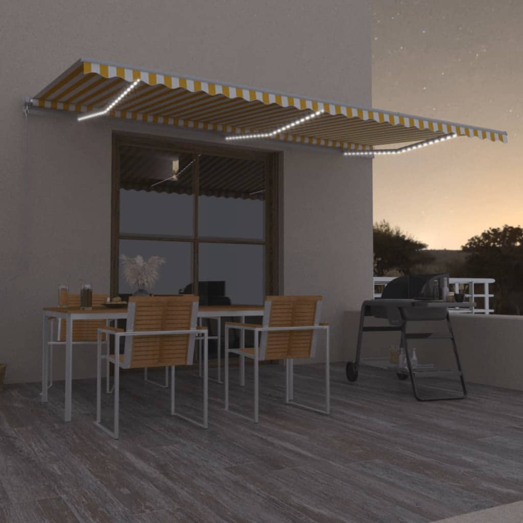 Manual retractable awning with LED 600x300 cm Yellow and white