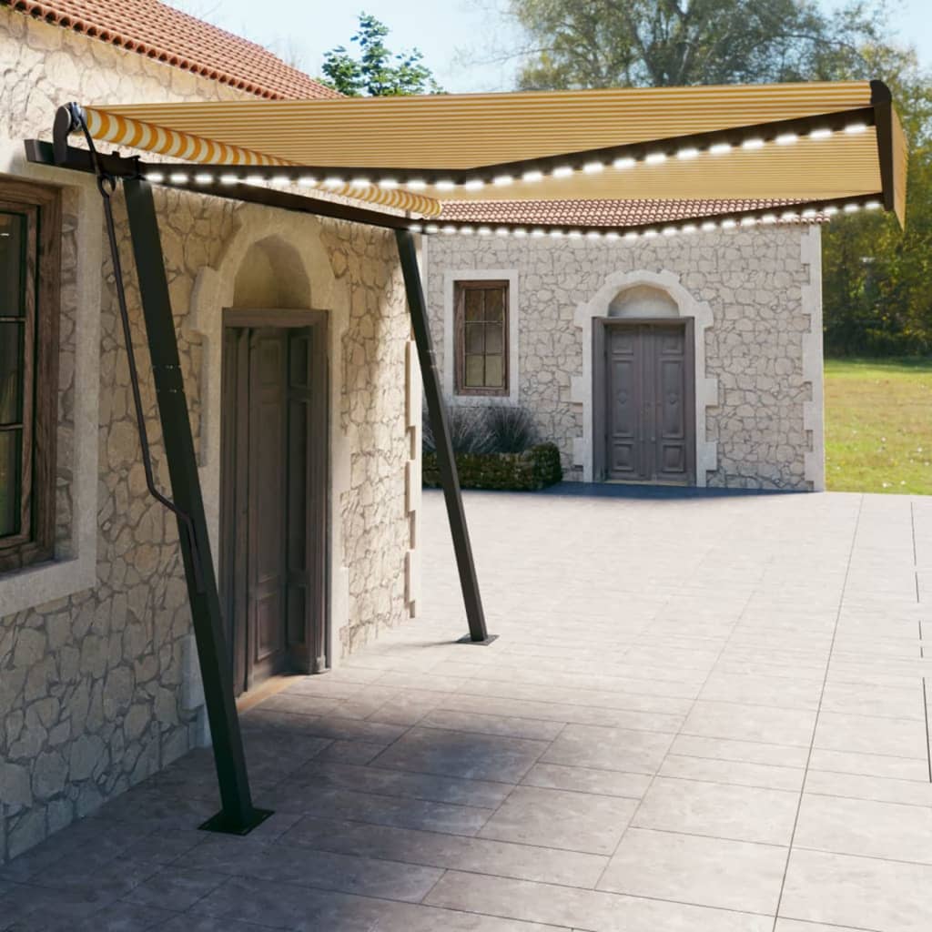 Manual retractable awning with LED 4x3 m Yellow and white