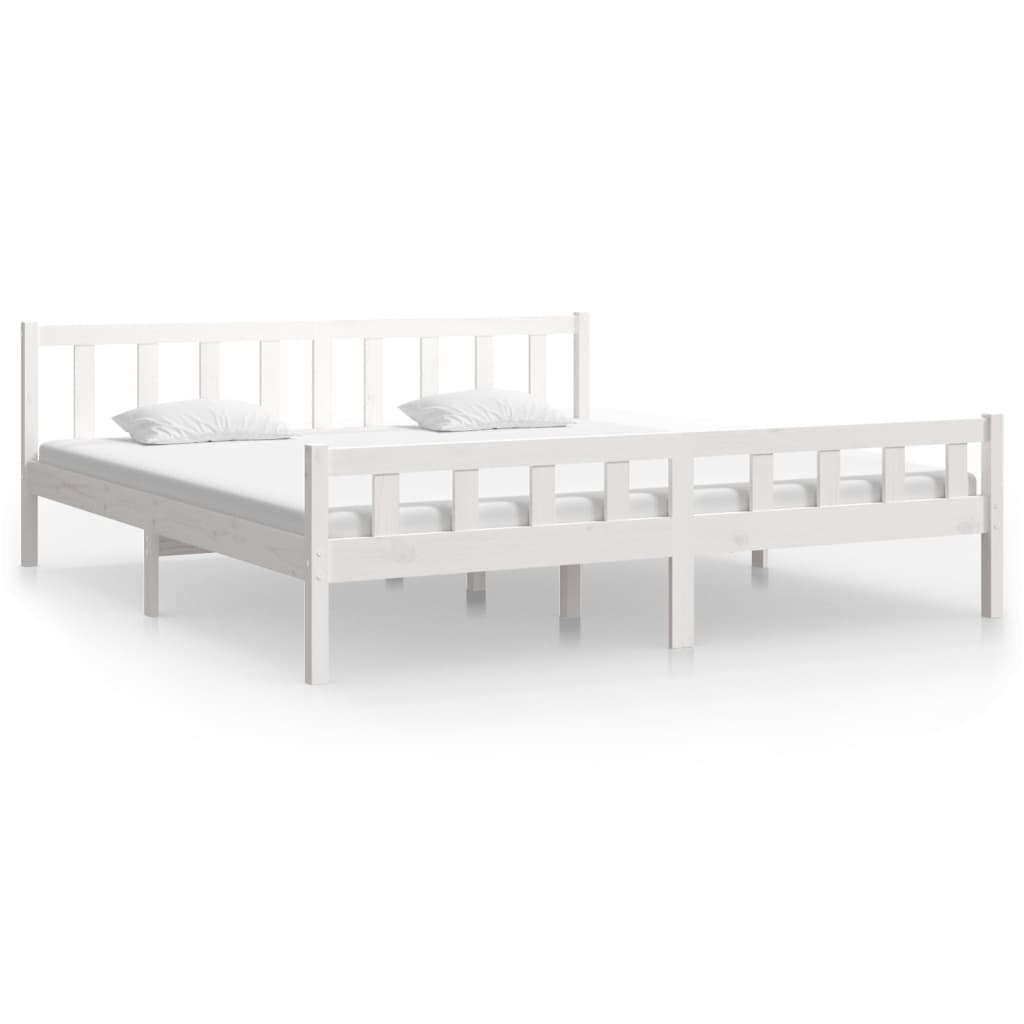 White solid wood bed frame without mattress