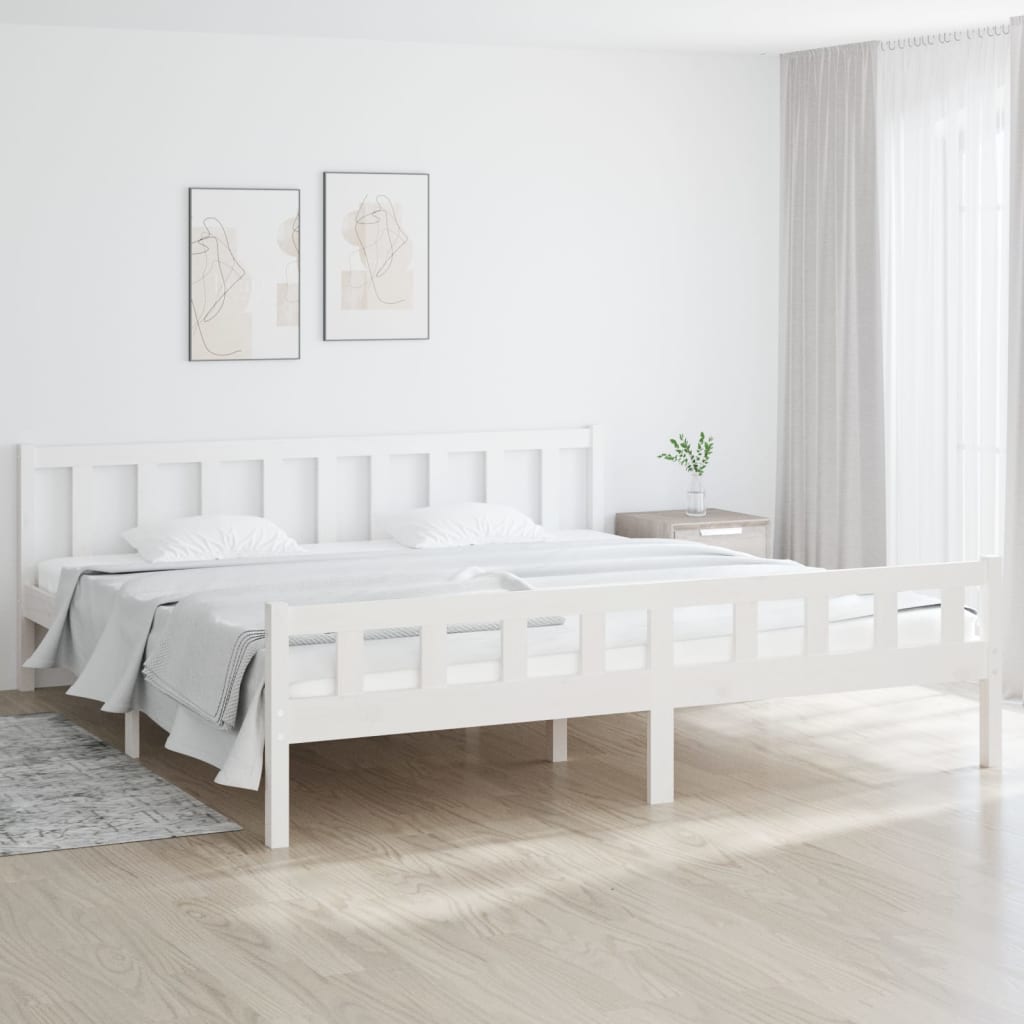 White solid wood bed frame without mattress