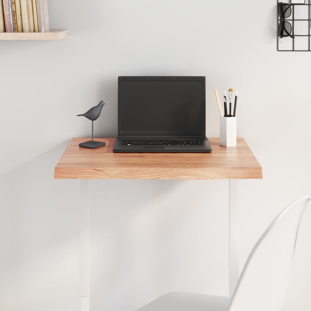 Light brown table top in treated solid oak wood