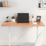 Light brown table top in treated solid oak wood