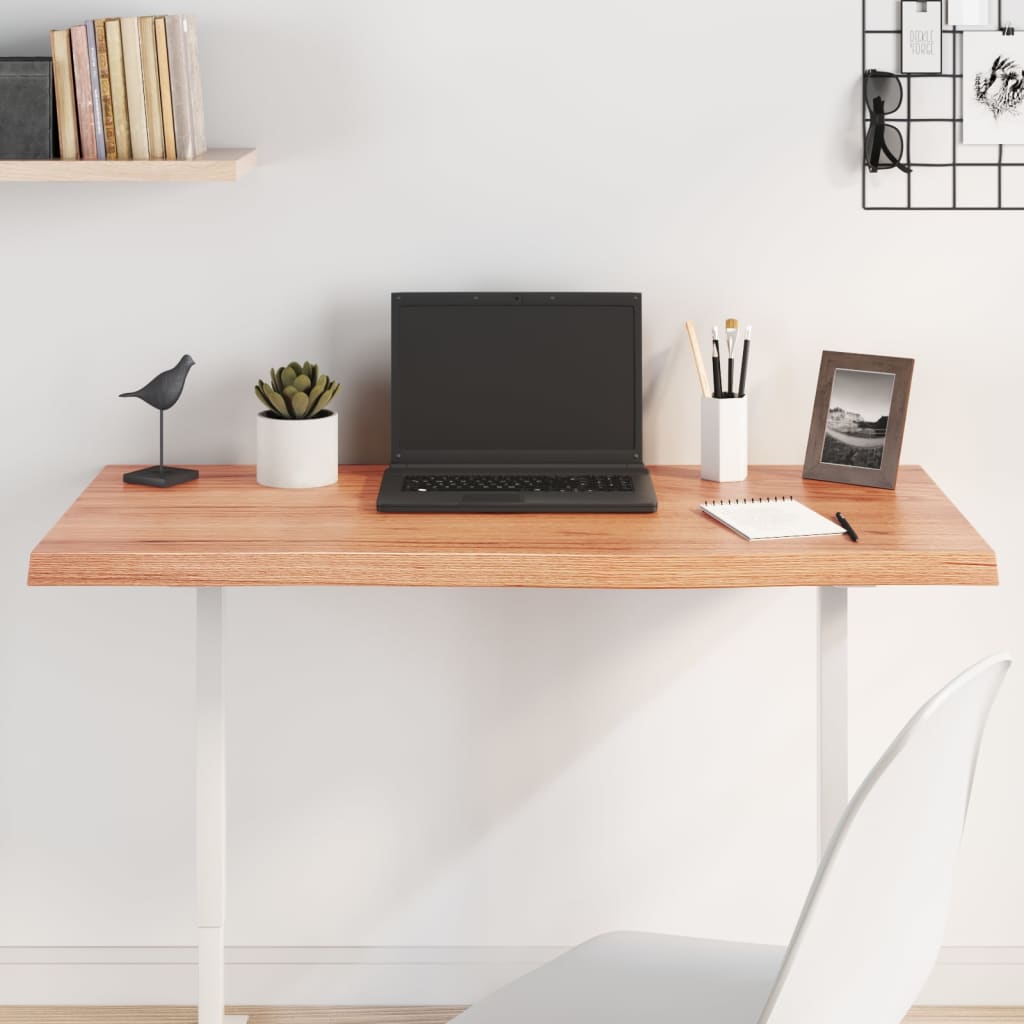 Light brown table top in treated solid oak wood