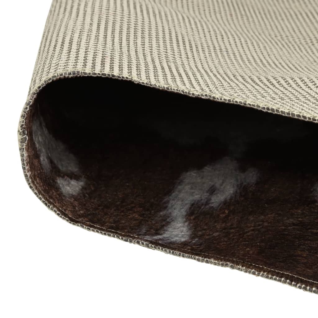 Tapis marron et blanc motif vache lavable antidérapant