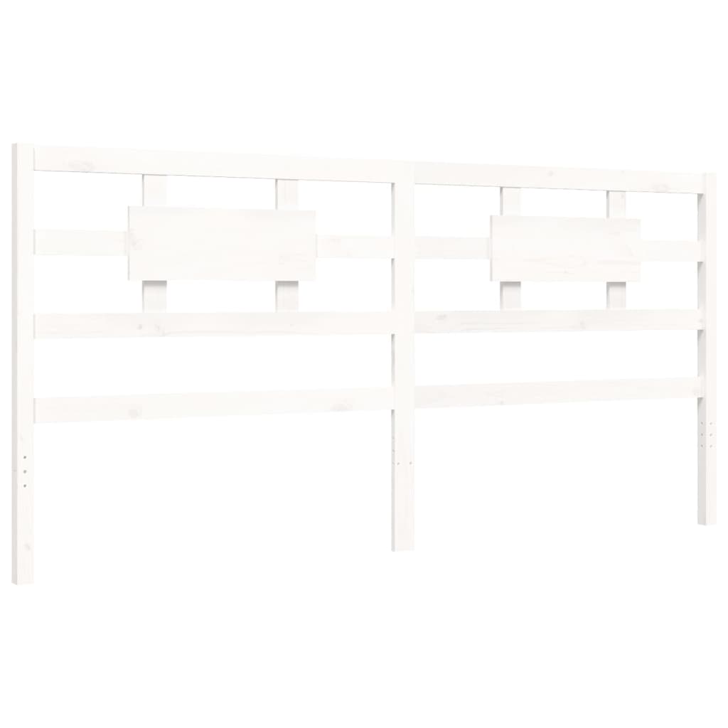 White solid wood bed frame without mattress