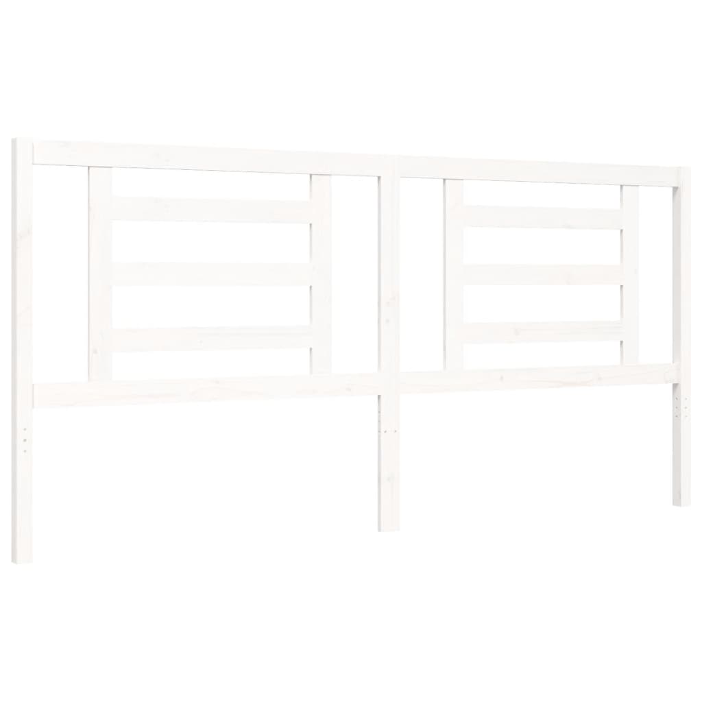 White solid wood bed frame without mattress