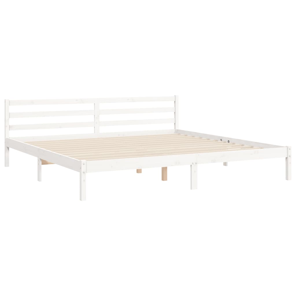 White solid wood bed frame without mattress