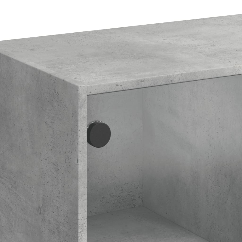 Bookcase with concrete gray doors 136x37x142 cm