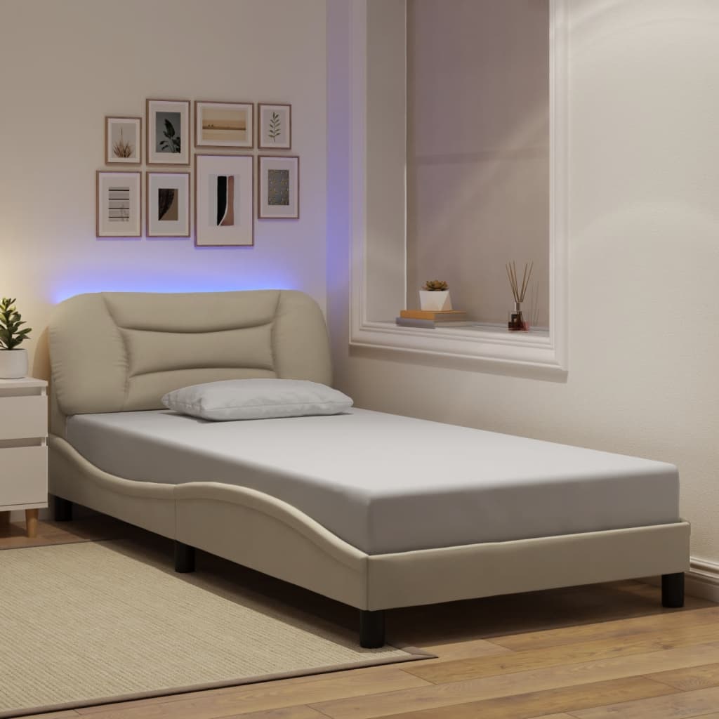 Cadre de lit avec LED sans matelas crème 100x200 cm tissu