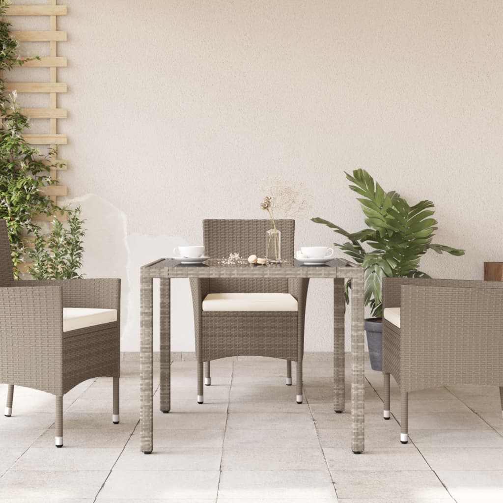 Table de jardin avec dessus en verre gris clair résine tressée