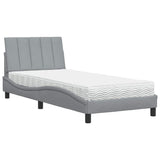 Bed with light gray mattress 90x200 cm fabric