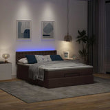 Lit ottoman avec matelas et LED marron foncé 140x190 cm tissu