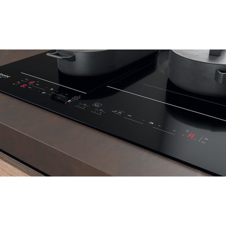 Table de cuisson induction - HOTPOINT - 3 zones - Zones modulables - L 59 x P 51 cm - HB2760BNE - 7200W total - Noir