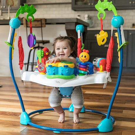 BABY EINSTEIN Aire d'Eveil ŗ Rebonds - Symphonie- cadeau bťbť, siŤge ŗ rebonds, pivotant 360į, multilingues