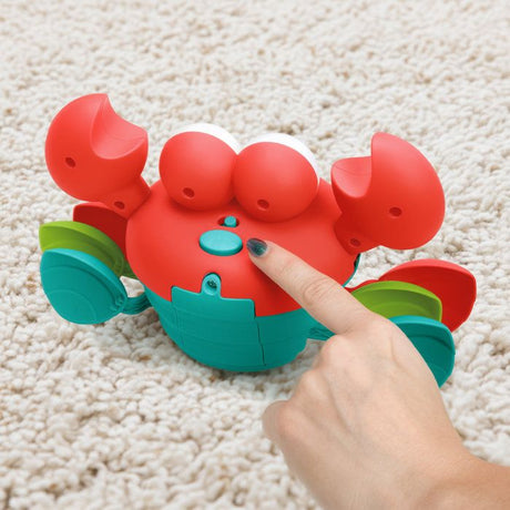 BRIGHT STARTS Crabe qui marche, Jouet bébé 6M+, jouet musical, jouet de motricité globale et fine, capteurs a obstacle, rouge
