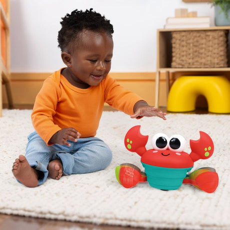 BRIGHT STARTS Crabe qui marche, Jouet bébé 6M+, jouet musical, jouet de motricité globale et fine, capteurs a obstacle, rouge