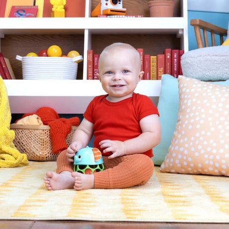BRIGHT STARTS Hochet musical lumineux -- Giggle & Glow - Jouet éléphant - Oball facile a saisir - 0M+
