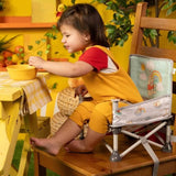 DISNEY BABY -WINNIE- Rehausseur de chaise pliable, nomade, de voyage, Léger et facile a nettoyer, Sac de transport inclus