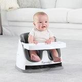 INGENUITY Réhausseur de chaise bébé enfant de 6 mois a 3 ans, Base 2 en 1 Gris, plateau amovible, rangement et nettoyage facile