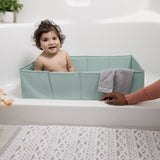 INGENUITY - Baignoire bébé pliable - Nomade - Doublure imperméable - Facile a nettoyer