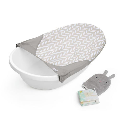 INGENUITY - Baignoire bébé Sylvi - Hamac évolutif de nourrisson jusqu'a 6 mois, gant de toilette et livre bain bébé inclus 24M+