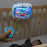 BABY EINSTEIN Veilleuse bébé - Reves marins - Réglage 25 min lumiere, son, Cadeau Noel bébé, attache lit, télécommande
