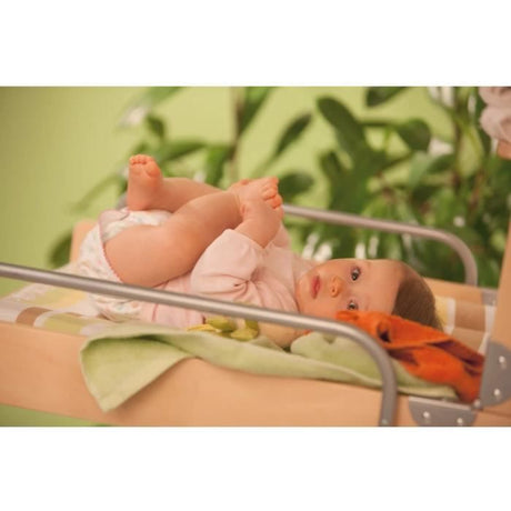 Table a langer murale rabattable - ROBA - DSCHUNGELBABY - Matelas rayé multicolore inclus - 2 Étageres intégrées - Bois Naturel