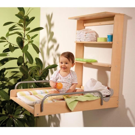 Table a langer murale rabattable - ROBA - DSCHUNGELBABY - Matelas rayé multicolore inclus - 2 Étageres intégrées - Bois Naturel