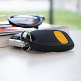 Télécommande 2 canaux - SCS SENTINEL - SimplyControl - Jaune, portée 40m, fréquence 433.92 MHz, pile lithium CR2032 incluse