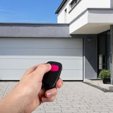 Télécommande 2 canaux - SCS SENTINEL - SimplyControl - Fuschia, portée 40m, fréquence 433.92 MHz, pile lithium CR2032 incluse