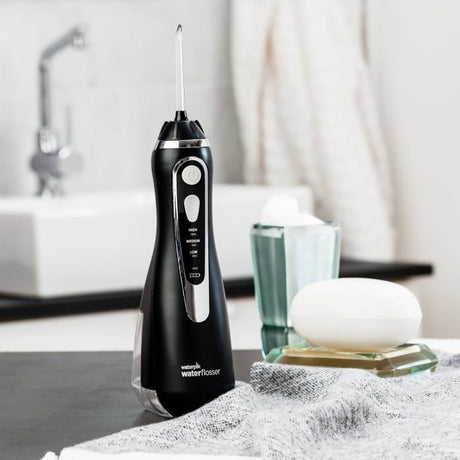 Jet Dentaire - WATERPIK - WP-582 Advanced - Sans Fil - Rechargeable - 3 Niveaux de pression - 4 Embouts