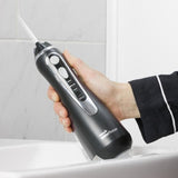 Jet Dentaire - WATERPIK - WP-582 Advanced - Sans Fil - Rechargeable - 3 Niveaux de pression - 4 Embouts