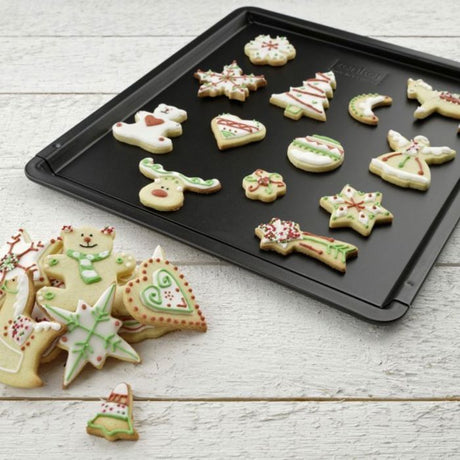 Ensemble avec plaque a pâtisserie extensible et 10 emporte-pieces de Noël - ZENKER