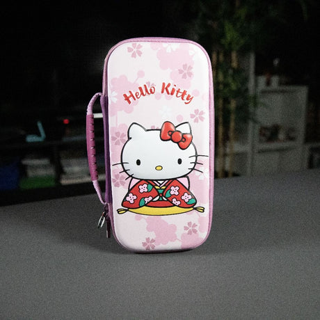 Housse de protection et transport - KONIX - Hello Kitty Nintendo Switch 2 - Rangement accessoires - Motif 3D - Rose